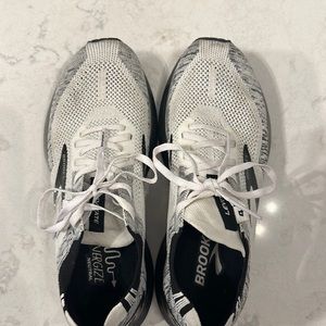 Brooks running shoes- only worn twice. Too small for my feet!